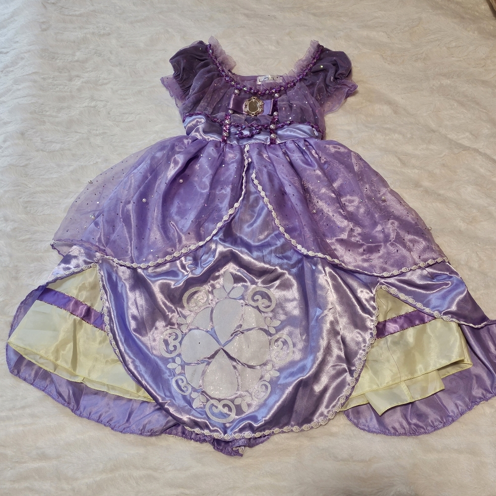 SOLD 2 Rapunzel dresses wear and tear on each but good to play with